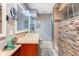 Updated bathroom with granite vanity and a walk-in shower at 6332 Newtown Cir # 32A1, Tampa, FL 33615