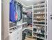 Large walk-in closet with ample shelving and hanging space at 6332 Newtown Cir # 32A1, Tampa, FL 33615