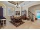 Formal dining room with wood table and chairs at 7153 Woods Bay Ct, Land O Lakes, FL 34637