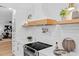 Stylish kitchen showcasing a wood range hood, white subway tile, and quartz countertops at 7231 Woodbrook Dr, Tampa, FL 33625