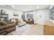 Inviting living room with brown sofas and a large area rug at 807 Lenna Ave, Seffner, FL 33584