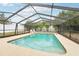 Relax and enjoy the sunshine by this beautiful screened-in pool at 807 Lenna Ave, Seffner, FL 33584