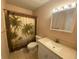 Simple bathroom with shower/tub, toilet and vanity at 883 Sky Loch S Dr, Dunedin, FL 34698