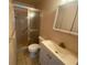 Bathroom with shower, toilet and vanity at 883 Sky Loch S Dr, Dunedin, FL 34698