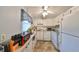 Kitchen with appliances and wood cabinets at 102 Cambridge Trl # 225, Sun City Center, FL 33573