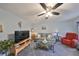 Living Room with comfy seating and TV at 102 Cambridge Trl # 225, Sun City Center, FL 33573