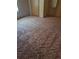 Bedroom with neutral carpeting and ample closet space at 1463 Bobolink St, Zephyrhills, FL 33540