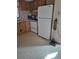 Galley kitchen with ample cabinetry and appliances at 1463 Bobolink St, Zephyrhills, FL 33540