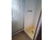 Small shower stall with glass enclosure at 1463 Bobolink St, Zephyrhills, FL 33540