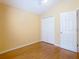 Bright bedroom with hardwood floors and double door closet at 15505 Granby Pl, Tampa, FL 33624