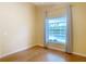 Bedroom with hardwood floors and a view of the pool at 15505 Granby Pl, Tampa, FL 33624