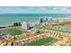 Aerial view of luxury waterfront home and community at 1613 Sand Key Estates Ct, Clearwater, FL 33767