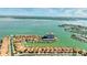 Aerial view showing waterfront property location in a luxury community at 1613 Sand Key Estates Ct, Clearwater, FL 33767