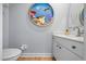 Stylish bathroom with a nautical-themed vanity at 1613 Sand Key Estates Ct, Clearwater, FL 33767