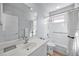 Clean bathroom with a bathtub and updated vanity at 1613 Sand Key Estates Ct, Clearwater, FL 33767