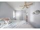 Main bedroom with ensuite bathroom and water view at 1613 Sand Key Estates Ct, Clearwater, FL 33767