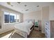 Bedroom with water views and a dresser at 1613 Sand Key Estates Ct, Clearwater, FL 33767