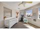 Bedroom with water views and a crib at 1613 Sand Key Estates Ct, Clearwater, FL 33767