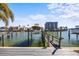 Private boat dock and lift in a marina at 1613 Sand Key Estates Ct, Clearwater, FL 33767