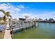 Private boat dock with lift for your boat at 1613 Sand Key Estates Ct, Clearwater, FL 33767