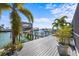 Private boat docks provide convenient water access at 1613 Sand Key Estates Ct, Clearwater, FL 33767