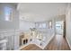 Upstairs hallway overlooking the living room and water view at 1613 Sand Key Estates Ct, Clearwater, FL 33767
