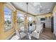 Eat in kitchen with granite countertops and island at 1613 Sand Key Estates Ct, Clearwater, FL 33767