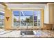 Kitchen with water view from window and granite countertop at 1613 Sand Key Estates Ct, Clearwater, FL 33767