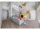 Bright living room featuring hardwood floors and high ceilings at 1613 Sand Key Estates Ct, Clearwater, FL 33767