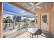 Covered patio with water views at 1613 Sand Key Estates Ct, Clearwater, FL 33767