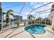 Enclosed pool and patio area at 1613 Sand Key Estates Ct, Clearwater, FL 33767