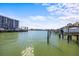 Stunning waterfront view with many boats at 1613 Sand Key Estates Ct, Clearwater, FL 33767