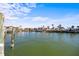 Scenic waterfront view with boats and docks at 1613 Sand Key Estates Ct, Clearwater, FL 33767