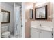 Bathroom with shower stall and a vanity with single sink at 1620 58Th S Ave # 3, St Petersburg, FL 33712