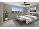 Spacious bedroom with large window and neutral decor at 19354 Yellow Clover Dr, Tampa, FL 33647