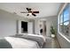 Main bedroom with ensuite bathroom access and plenty of natural light at 19354 Yellow Clover Dr, Tampa, FL 33647