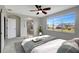 Main bedroom with ensuite bathroom access and large windows at 19354 Yellow Clover Dr, Tampa, FL 33647