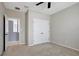 Bright bedroom with double doors and access to hallway at 19354 Yellow Clover Dr, Tampa, FL 33647
