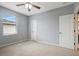 Well-lit bedroom with ceiling fan and neutral color palette at 19354 Yellow Clover Dr, Tampa, FL 33647