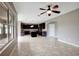 Spacious kitchen with dark wood cabinets, large island, and granite countertops at 19354 Yellow Clover Dr, Tampa, FL 33647