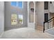 Spacious living room with high ceilings and large windows at 19354 Yellow Clover Dr, Tampa, FL 33647