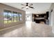 Living area with open floor plan and kitchen access at 19354 Yellow Clover Dr, Tampa, FL 33647