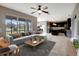 Open living room with kitchen views and tile flooring at 19354 Yellow Clover Dr, Tampa, FL 33647