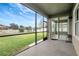 Spacious screened patio, access to backyard at 19354 Yellow Clover Dr, Tampa, FL 33647