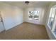 Bedroom with tile floors and a large window at 2035 11Th S St, St Petersburg, FL 33705