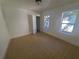 Bedroom with tile floors and two windows offering natural light at 2035 11Th S St, St Petersburg, FL 33705
