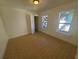 Bedroom with tile floors and two windows offering natural light at 2035 11Th S St, St Petersburg, FL 33705