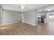 Bright living room with light gray walls and wood-look flooring at 2349 Grandin St, Holiday, FL 34690