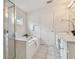 Main bathroom with soaking tub, shower, and double vanity at 25406 Lexington Oaks Blvd, Wesley Chapel, FL 33544
