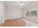 Spacious bedroom featuring light walls and wood flooring at 25406 Lexington Oaks Blvd, Wesley Chapel, FL 33544